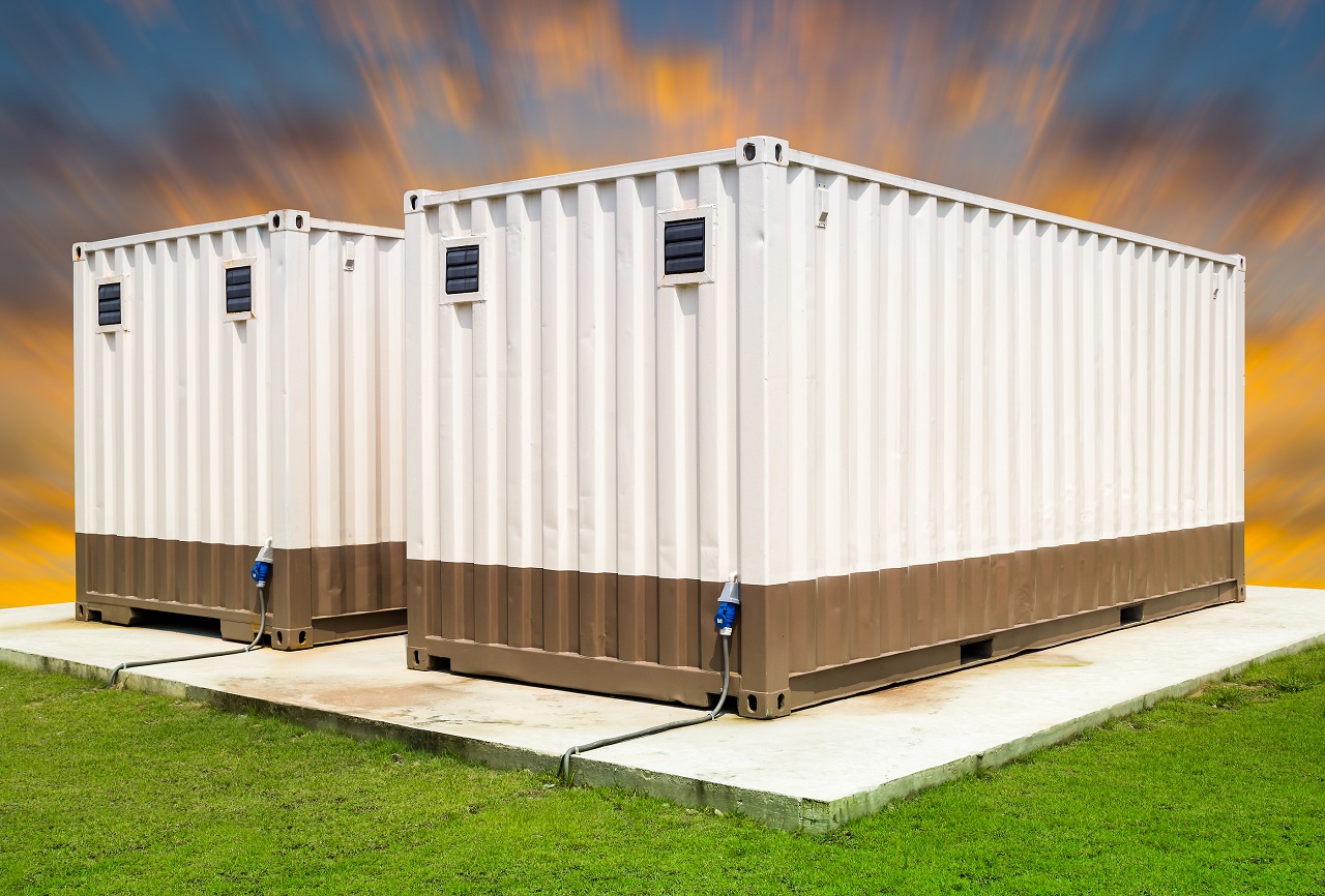 Container (white color) with blur sky background.